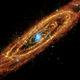 Illustration for article titled How three different types of light reveal the complete beauty of the Andromeda Galaxy